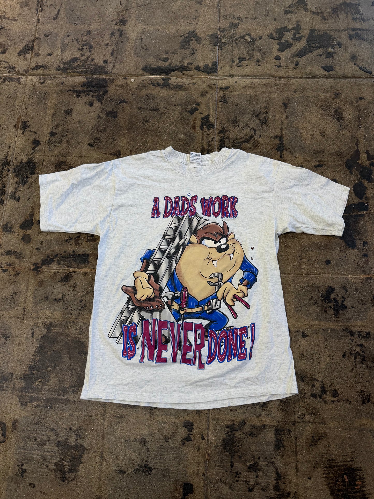 LOONEY TUNES TAZ. A DADS WORK IS NEVER DONE TEE