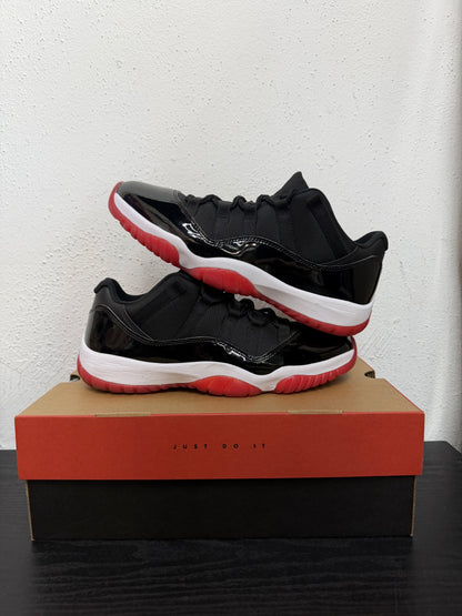 JORDAN 11 LOW BRED (USED)