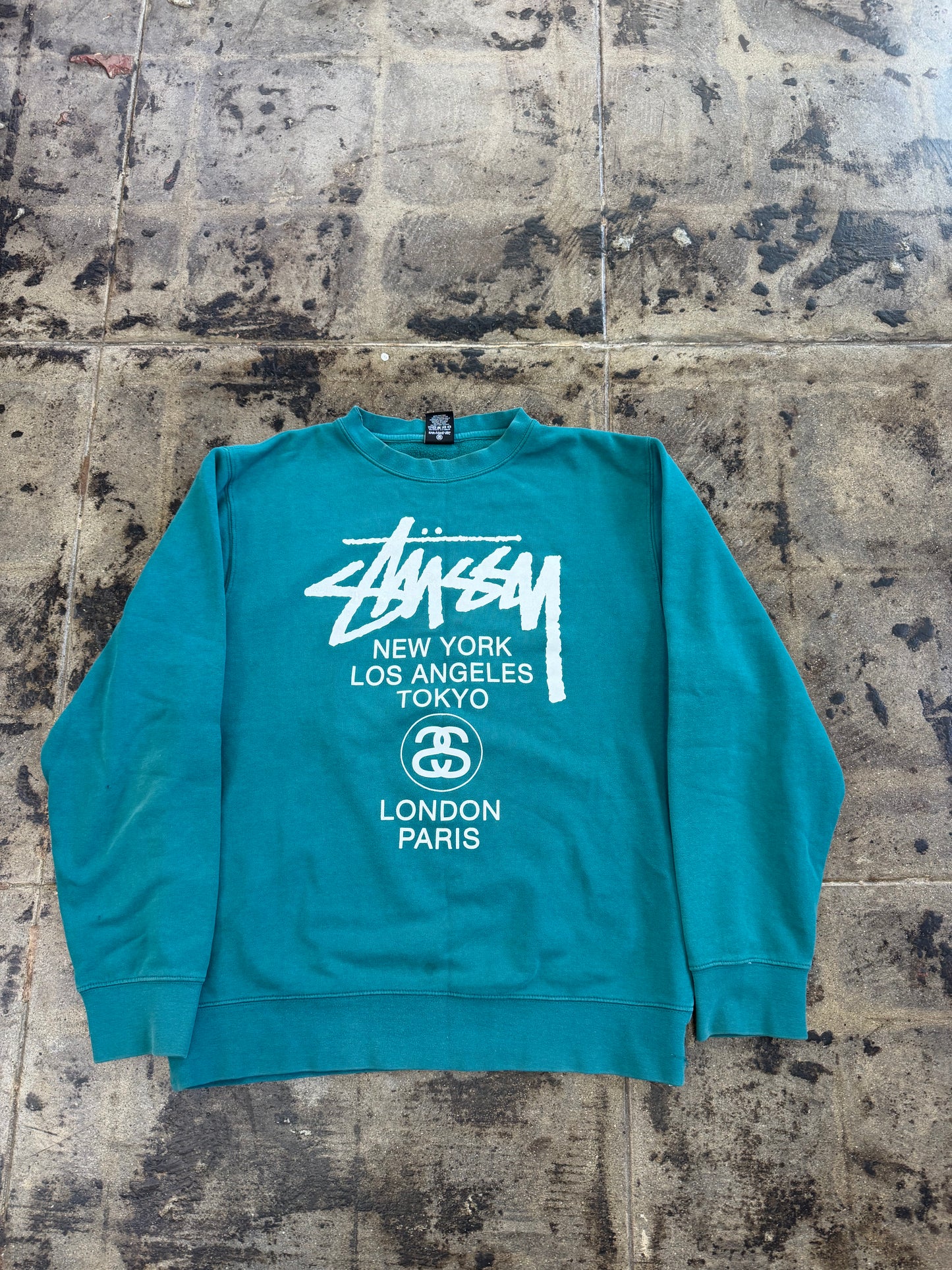 STUSSY WORLD TOUR TEAL CREWNECK (USED)