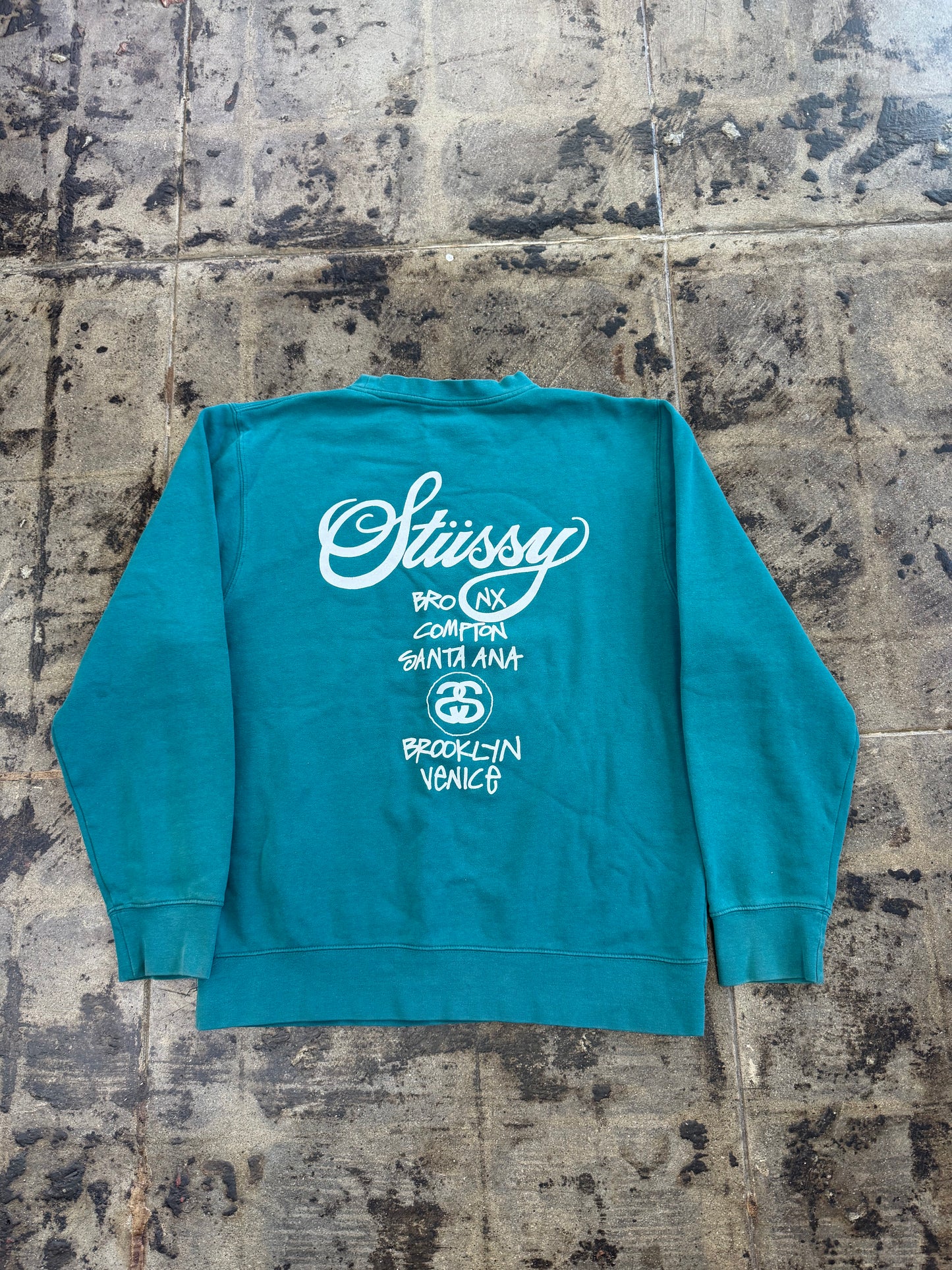 STUSSY WORLD TOUR TEAL CREWNECK (USED)