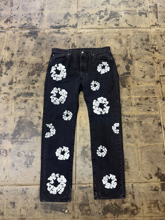 DENIM TEARS LEVI BLACK COTTON WREATH JEANS (USED)