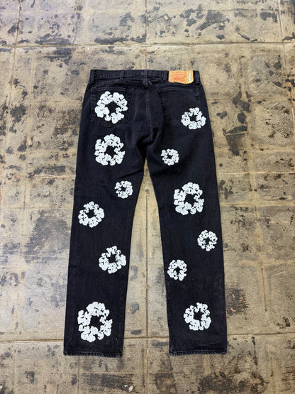 DENIM TEARS LEVI BLACK COTTON WREATH JEANS (USED)